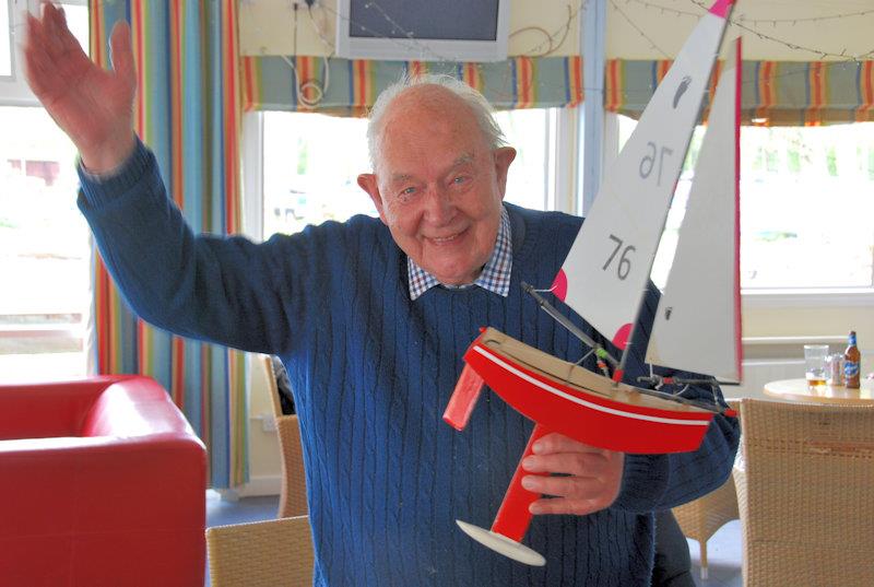 Last placed prizewinner, Charles Smith showing off one of the original Footy's brought over from New Zealand in 2002 - Footy National Championship at Frensham photo copyright Oliver Stollery taken at Frensham Pond Sailing Club and featuring the Footy class