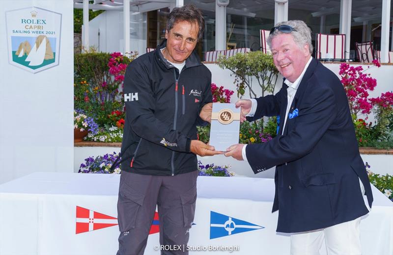 Fra Diavolo owner Vincenzo Addessi receives the prize for winning the Maxi Yacht Capri Trophy from International Maxi Associatino Secretary General Andrew McIrvine - photo © ROLEX / Studio Borlenghi